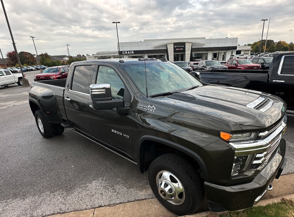GMC Sierra 3500 HD High Country parked outside Crain Buick GMC in Springdale, Arkansas